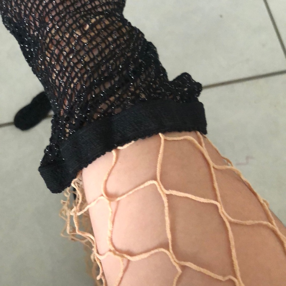 nude and black fishnets